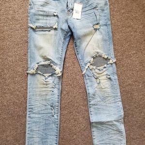 Men stretch wash blue ripped denim size 38. Regular slim fit. New never worn.